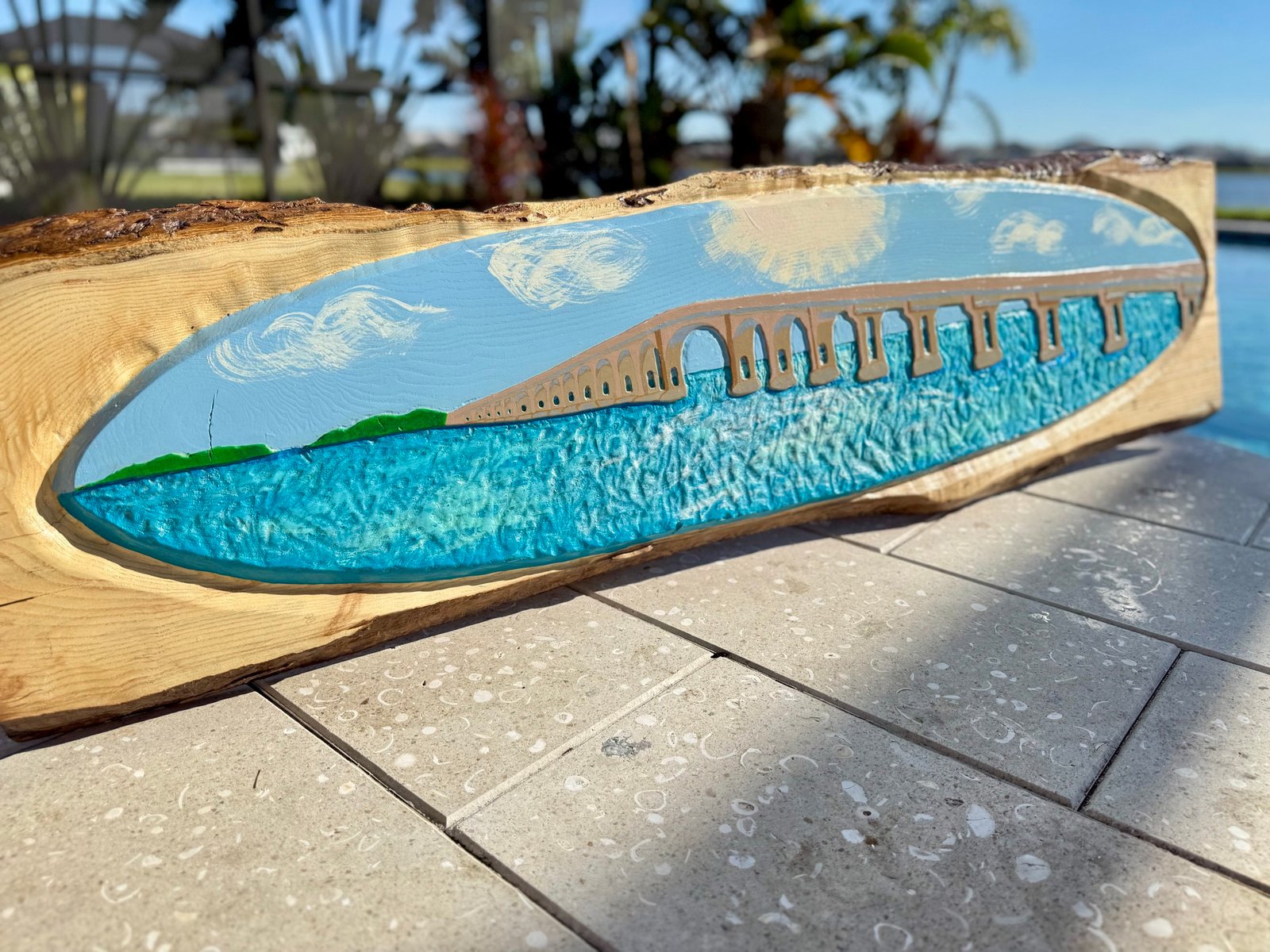 Seven Miles to Heaven live-edge wood slab carved with Florida's Seven Mile Bridge above turquoise water